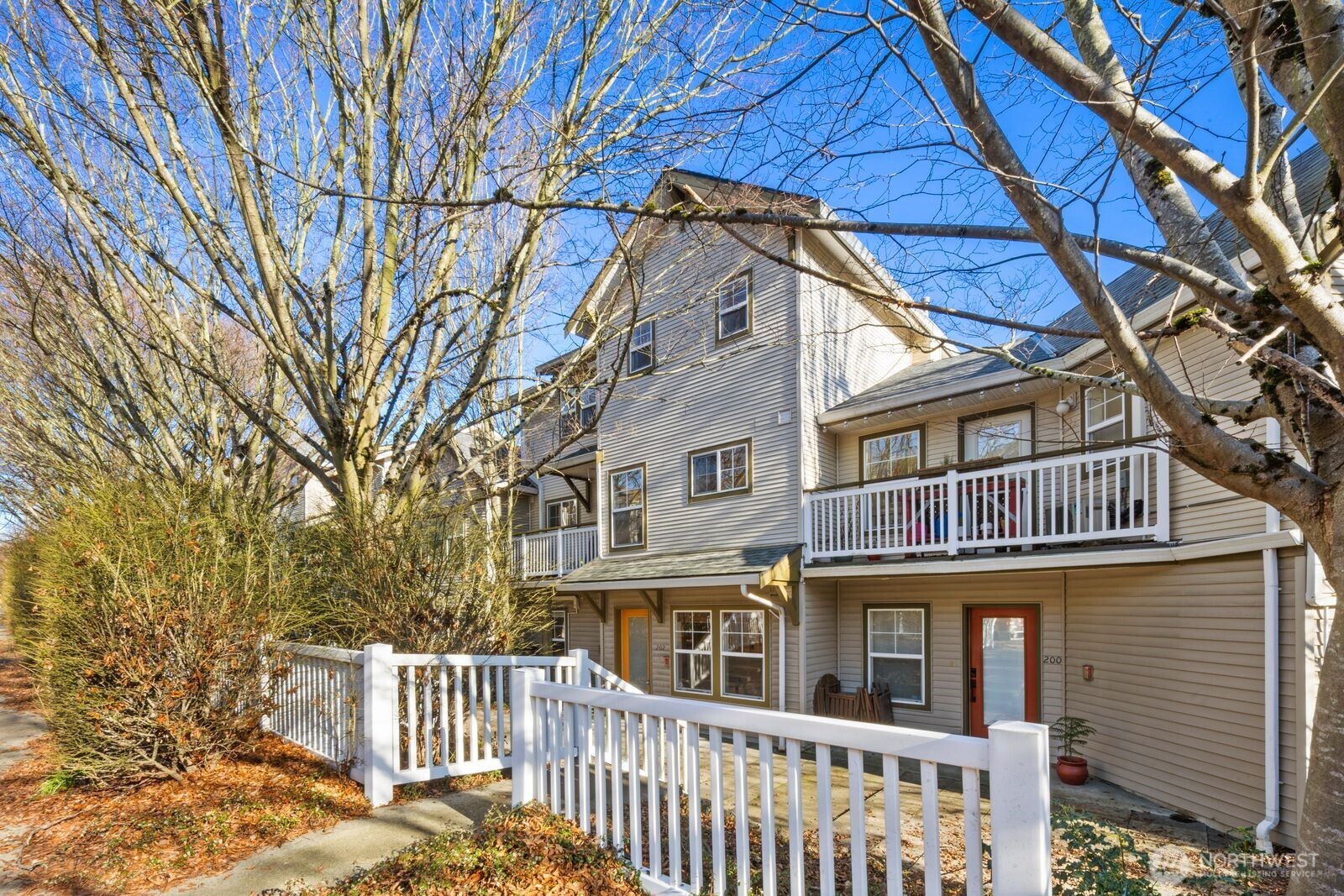 a view of a house with a small yard