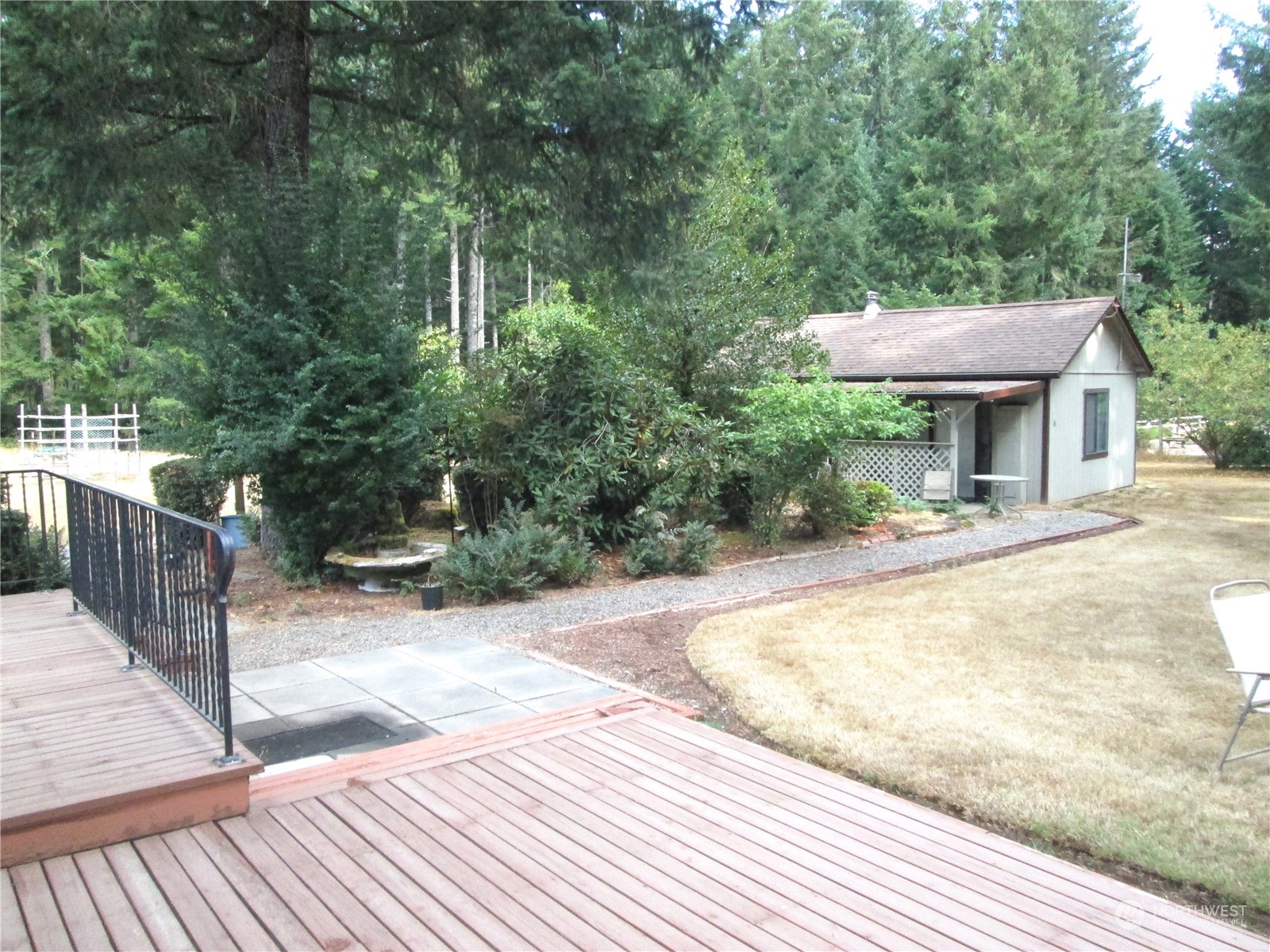 15 Webb Road Southwest Lakebay, WA 98349 - Photo 16 of 39 a view of a swimming pool with a patio