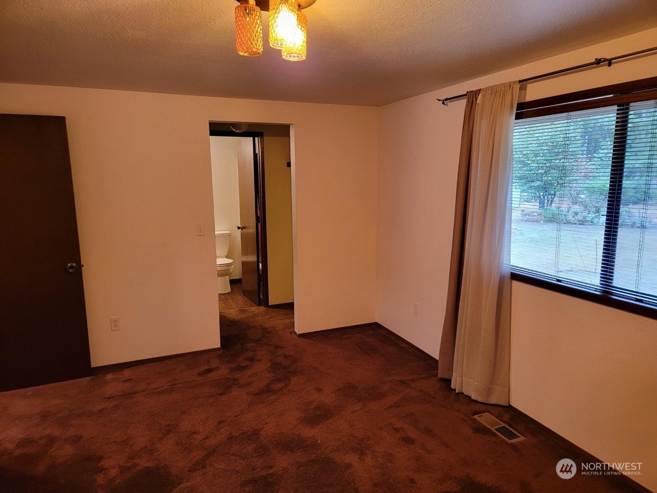 15 Webb Road Southwest Lakebay, WA 98349 - Photo 20 of 39 an empty room with window