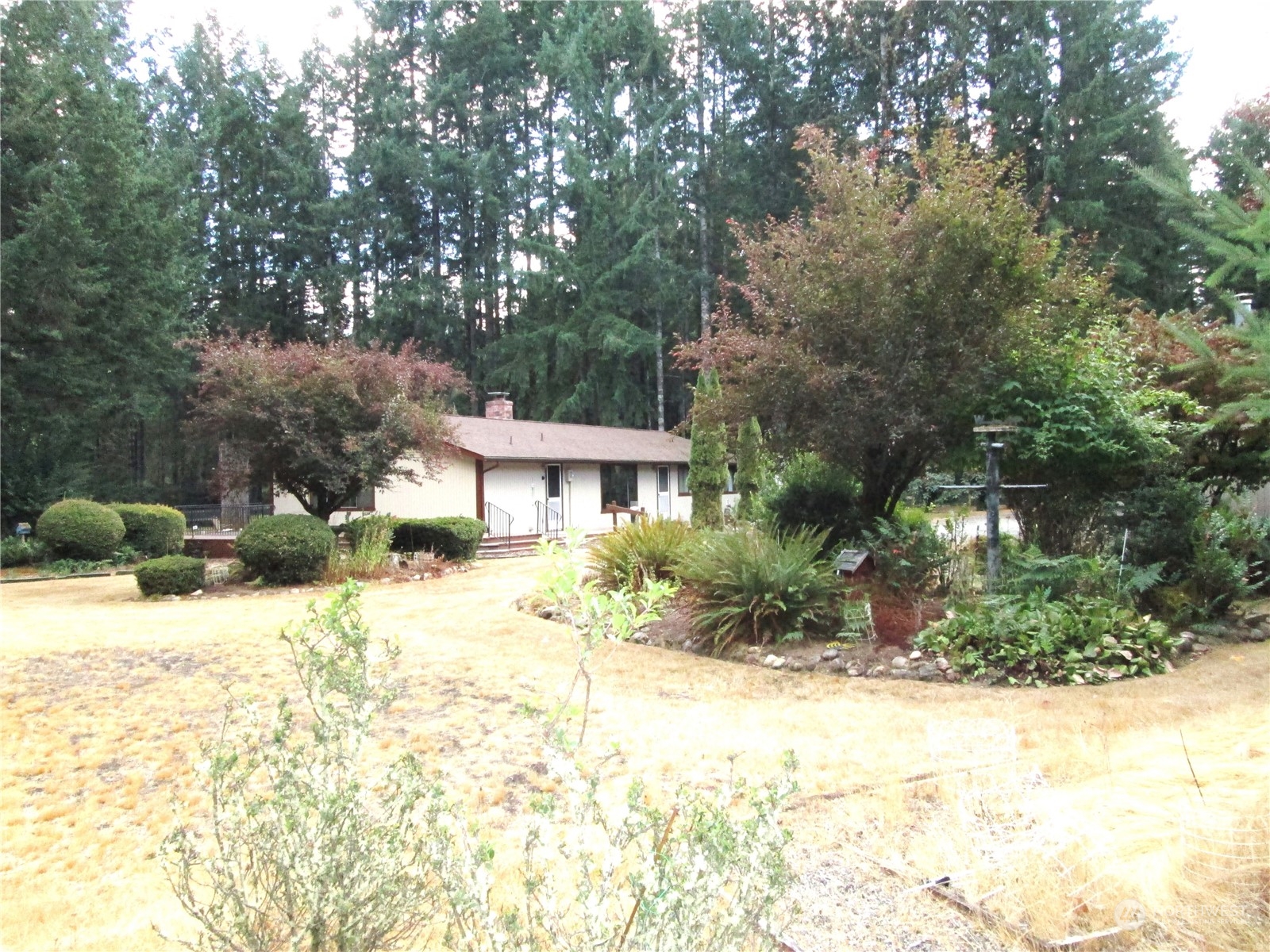 15 Webb Road Southwest Lakebay, WA 98349 - Photo 31 of 39 a view of a house with a yard