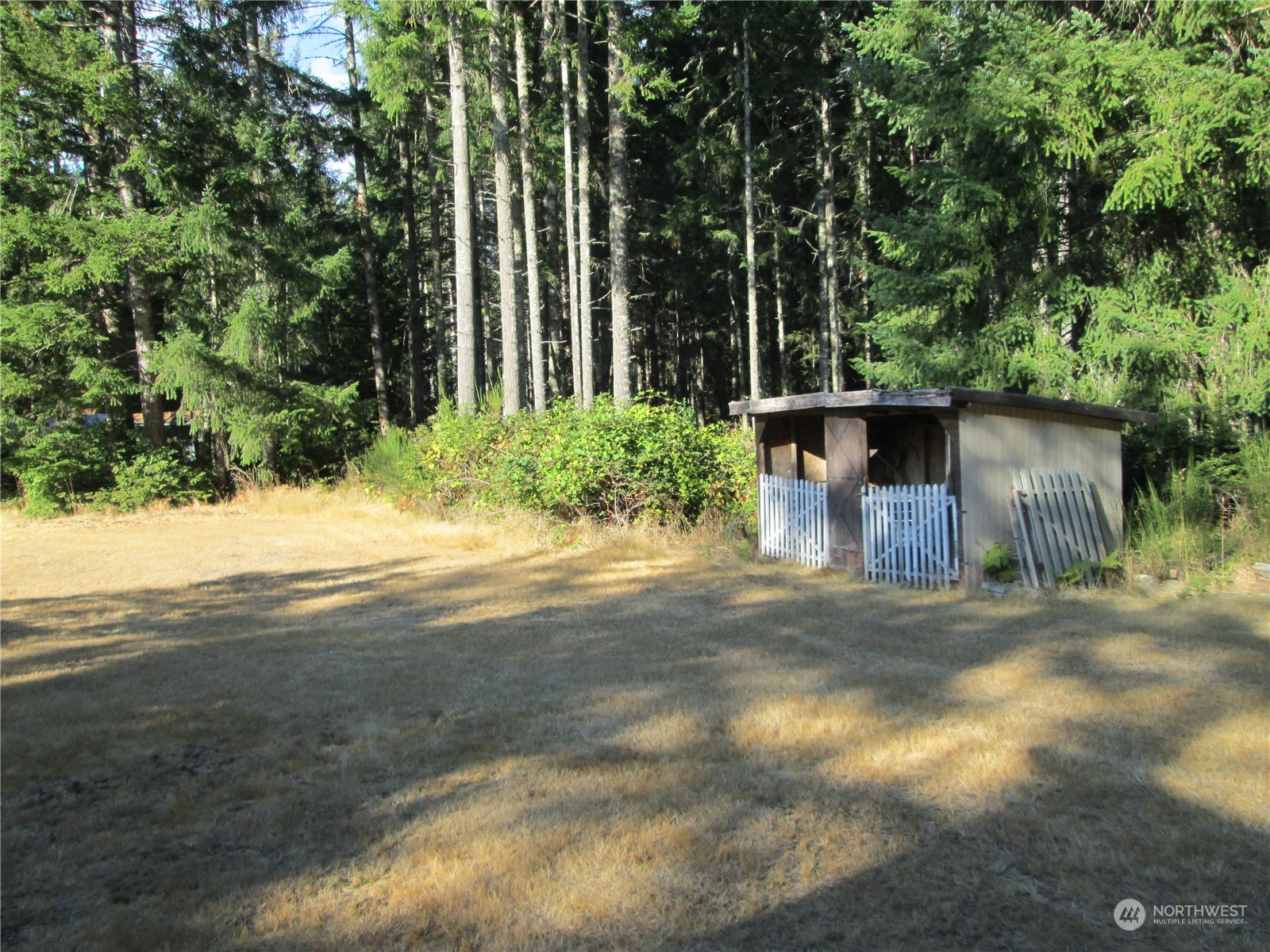 15 Webb Road Southwest Lakebay, WA 98349 - Photo 34 of 39 a view of a house with a yard