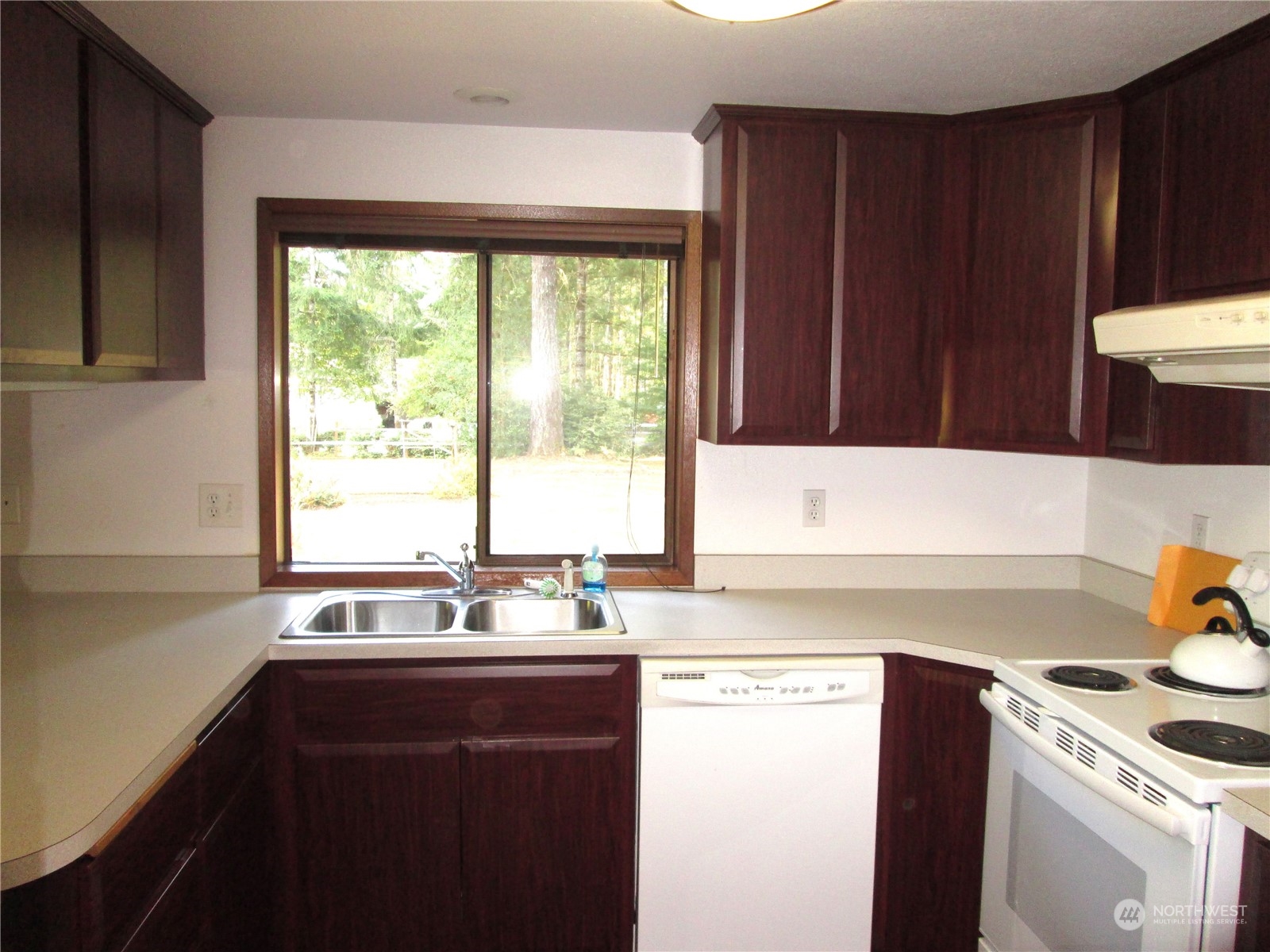 15 Webb Road Southwest Lakebay, WA 98349 - Photo 10 of 39 a kitchen with a sink and a window