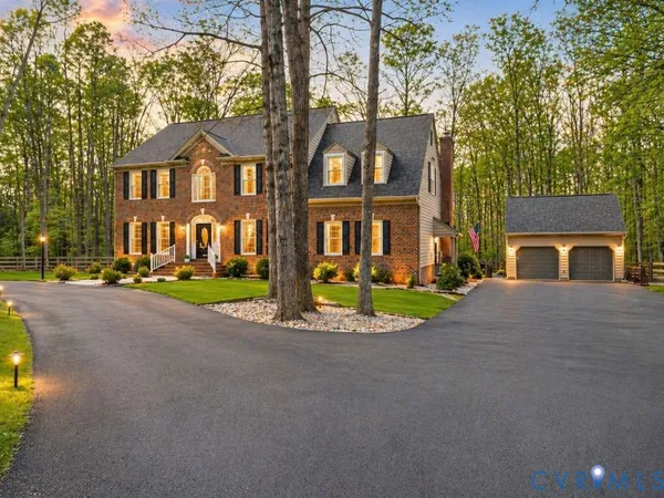 a front view of a house having yard