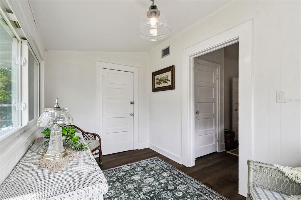 459 Bell Avenue Brooksville, FL 34601 - Photo 30 of 36 a living room with furniture and a potted plant