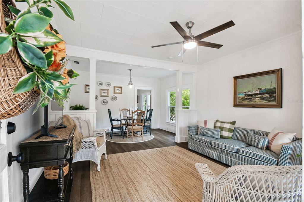 459 Bell Avenue Brooksville, FL 34601 - Photo 6 of 36 a living room with furniture and a potted plant