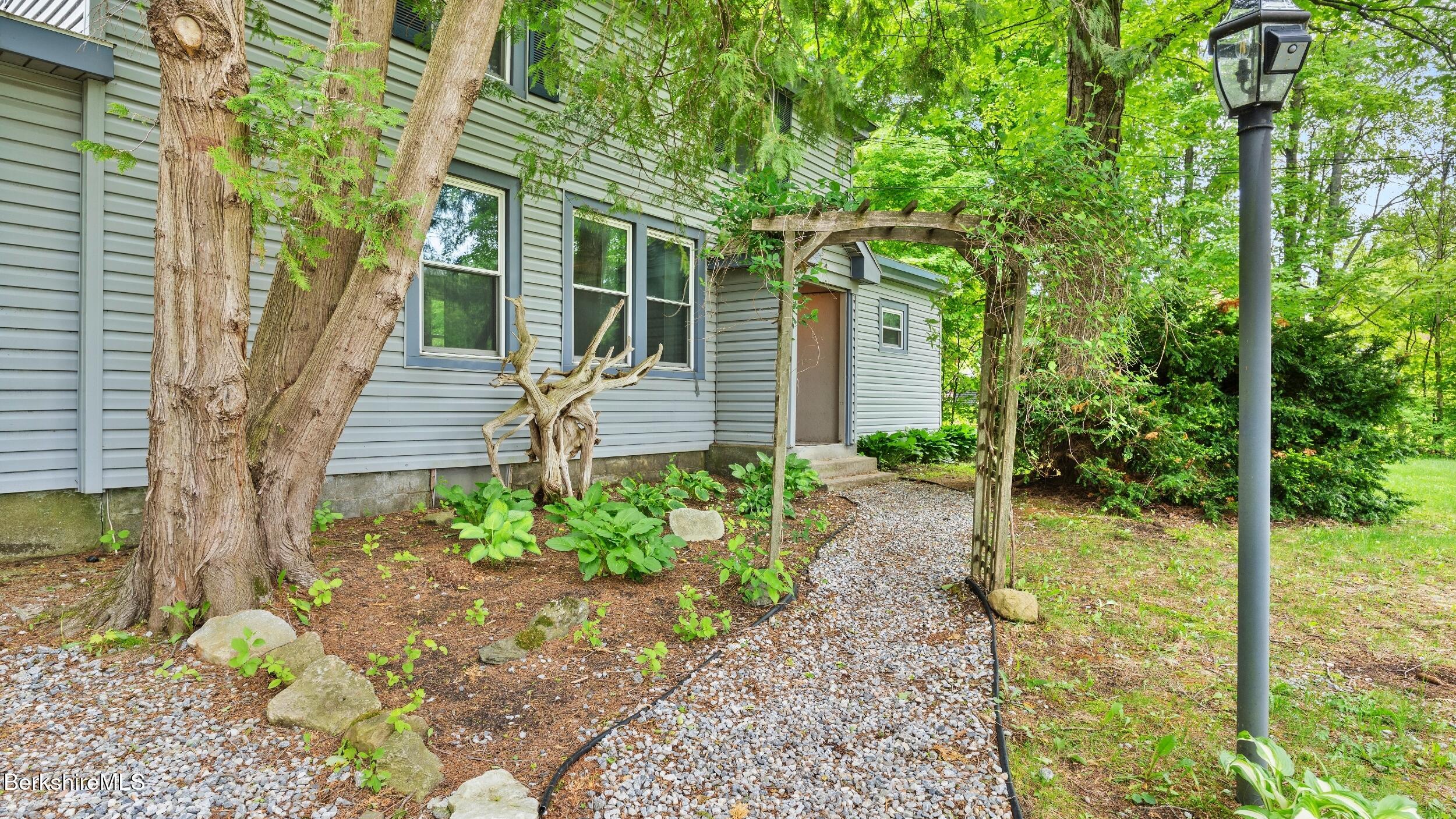349 New Lenox Road Lenox, MA 01240 - Photo 3 of 22 a view of a pathway of the house