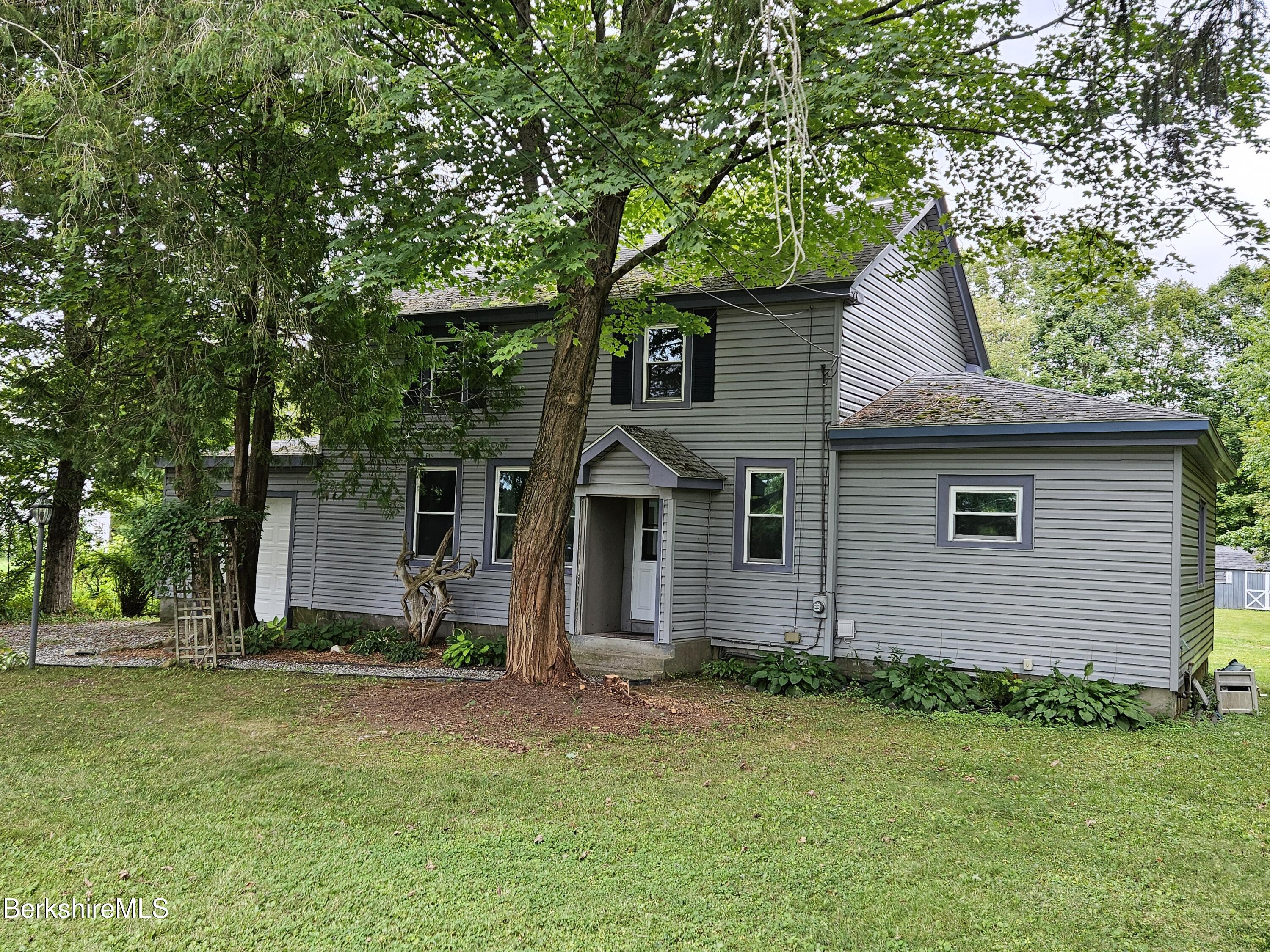 349 New Lenox Road Lenox, MA 01240 - Photo 4 of 22 front view of house with a yard