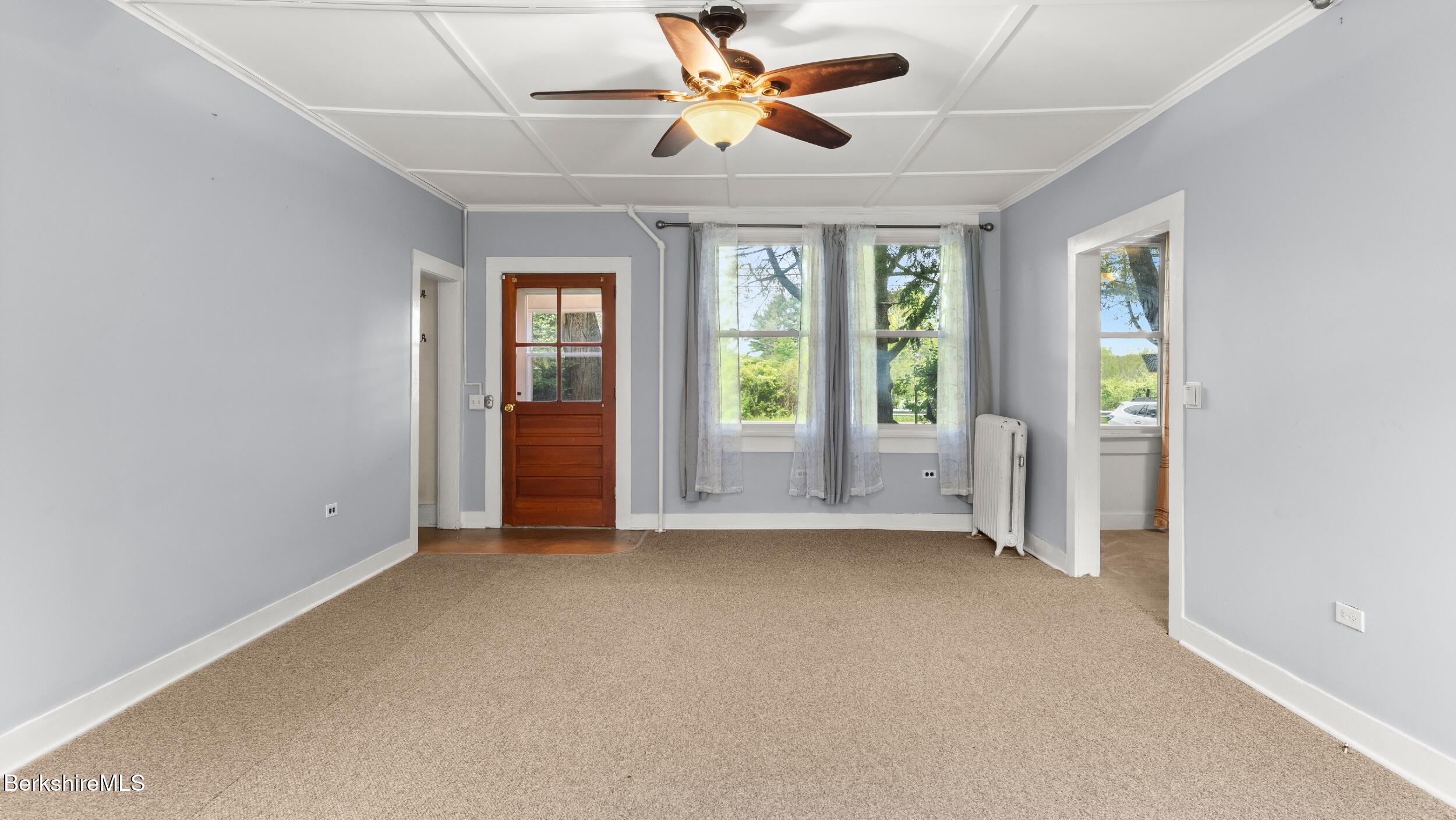 349 New Lenox Road Lenox, MA 01240 - Photo 9 of 22 a view of an empty room with a window