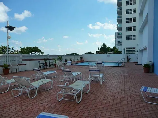 a view of a terrace with seating area
