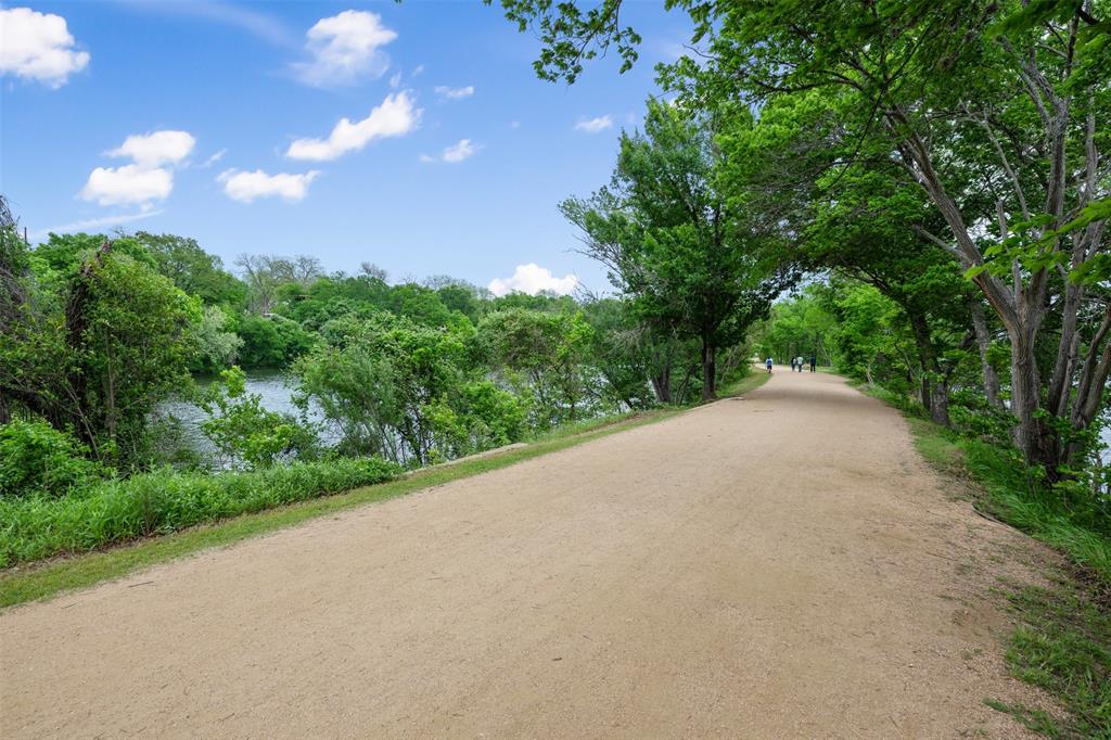 74 Julius Street Austin, TX 78702 - Photo 11 of 11 a view of a green yard
