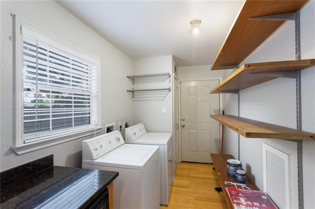 74 Julius Street Austin, TX 78702 - Photo 3 of 11 a bedroom with a bed and a window