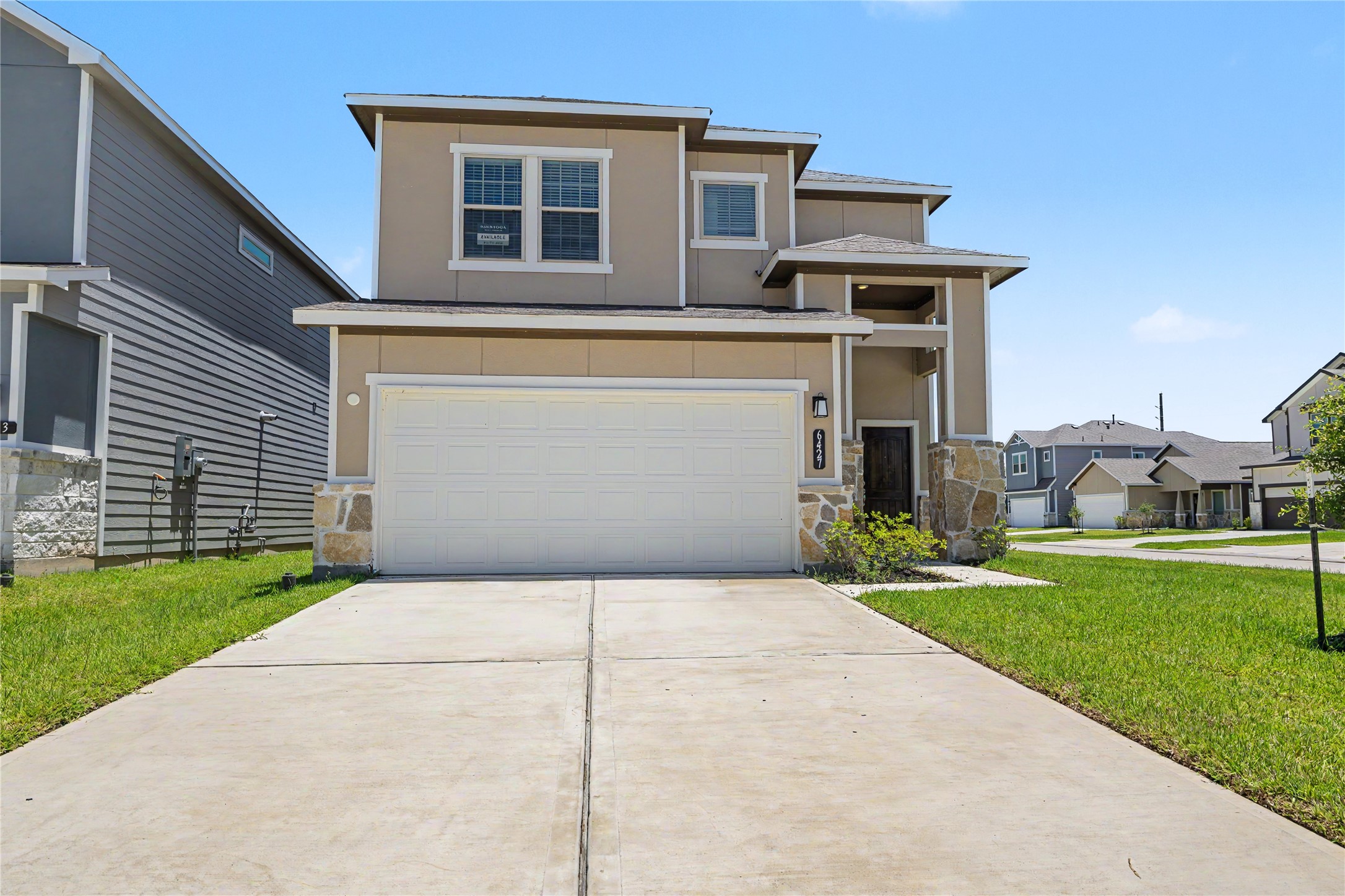 6427 Bolinas Court Rosharon, TX 77583 - Photo 1 of 49 a front view of a house with a yard and garage