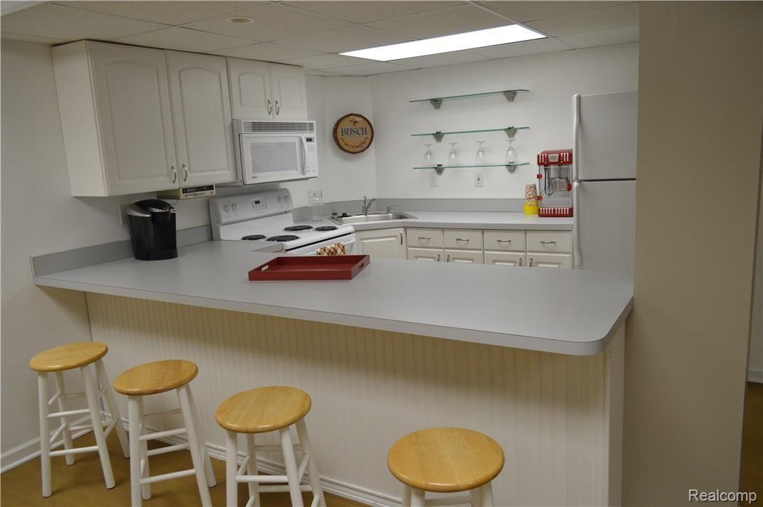 742 Caribou Court Rochester, MI 48307 - Photo 46 of 58 Finished Basement Full Kitchen