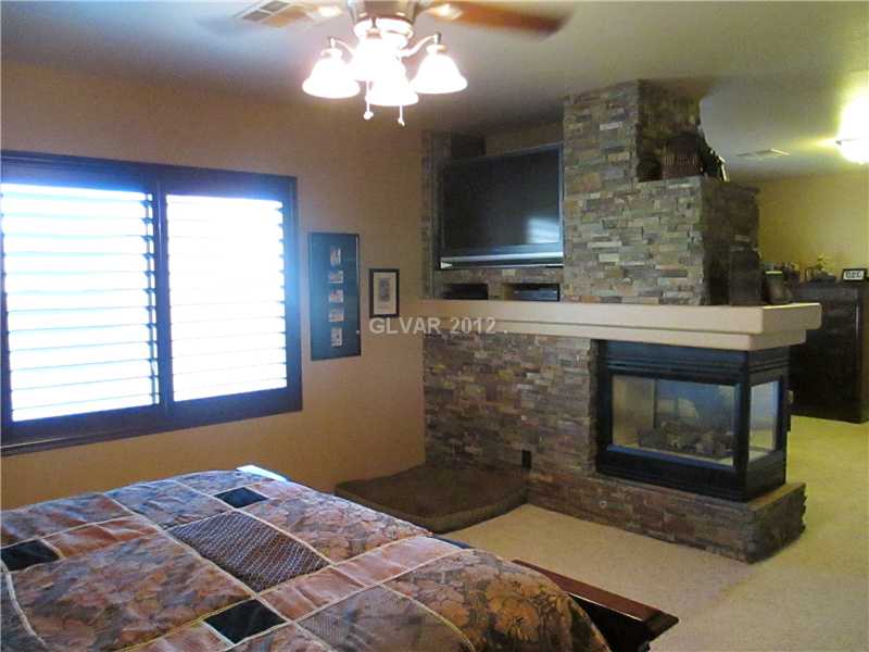 2465 Bench Reef Place Henderson, NV 89052 - Photo 24 of 28 Master Bedroom.
