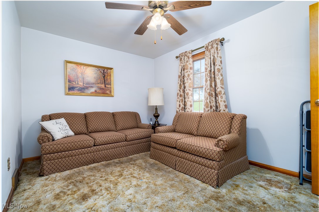 268 Beech Road Weirton, WV 26062 - Photo 29 of 48 Carpeted living area with a ceiling fan and baseboards
