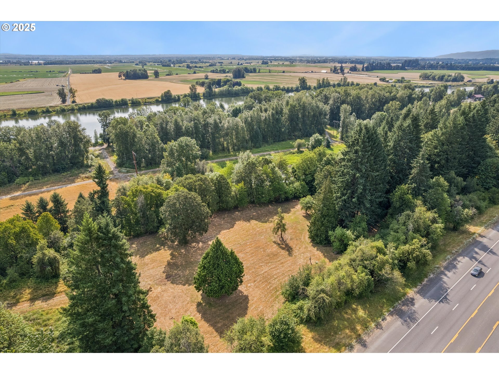 25900 Northwest St Helens Road Scappoose, OR 97056 - Photo 11 of 29 a view of a lake with a city view