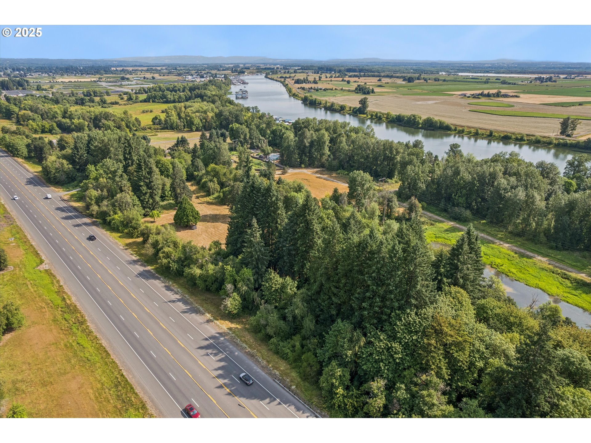 25900 Northwest St Helens Road Scappoose, OR 97056 - Photo 16 of 29 a view of a city and an ocean view