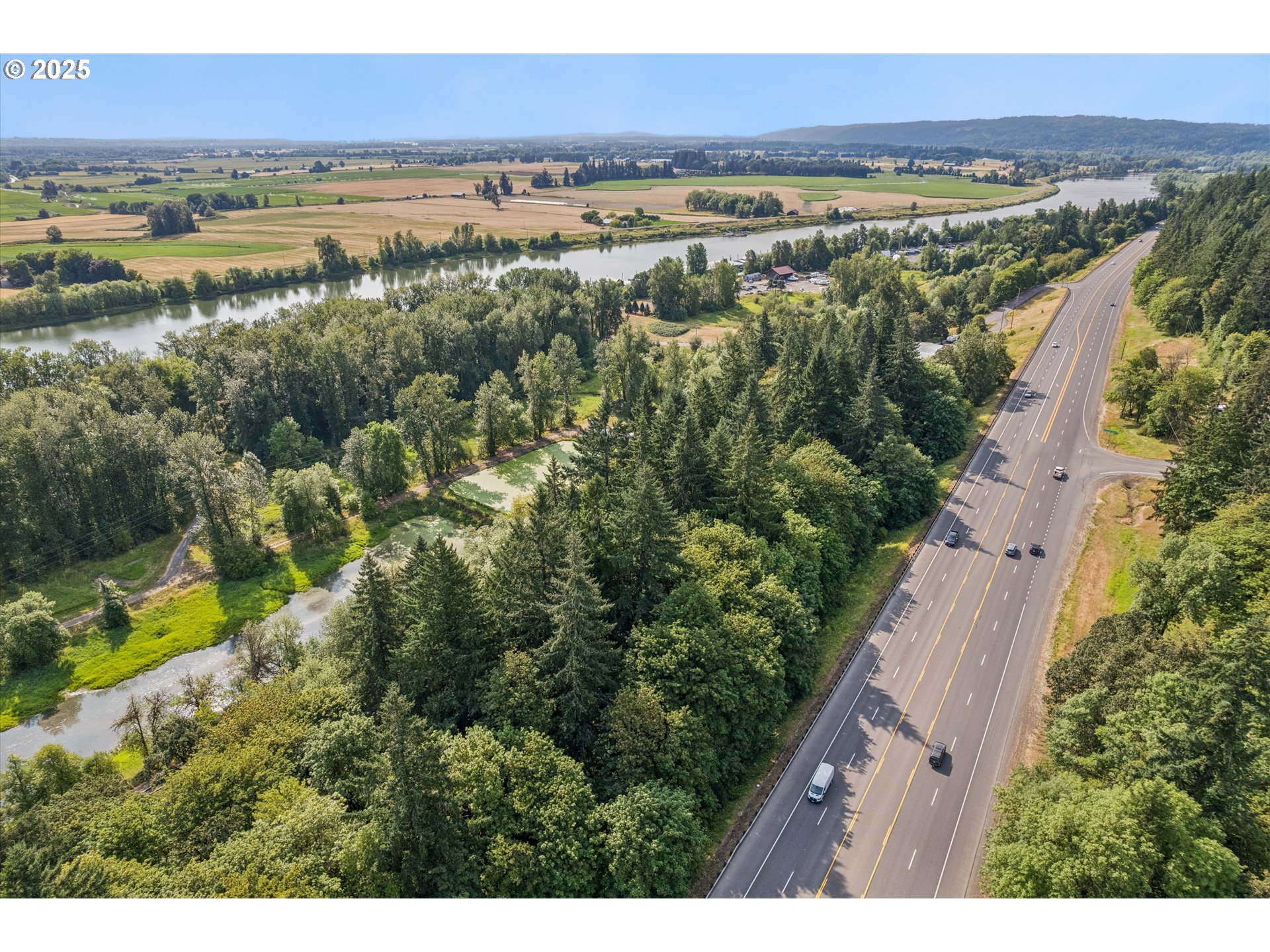 25900 Northwest St Helens Road Scappoose, OR 97056 - Photo 22 of 29 a view of a city with an ocean view