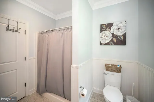 a view of a two chairs in the balcony