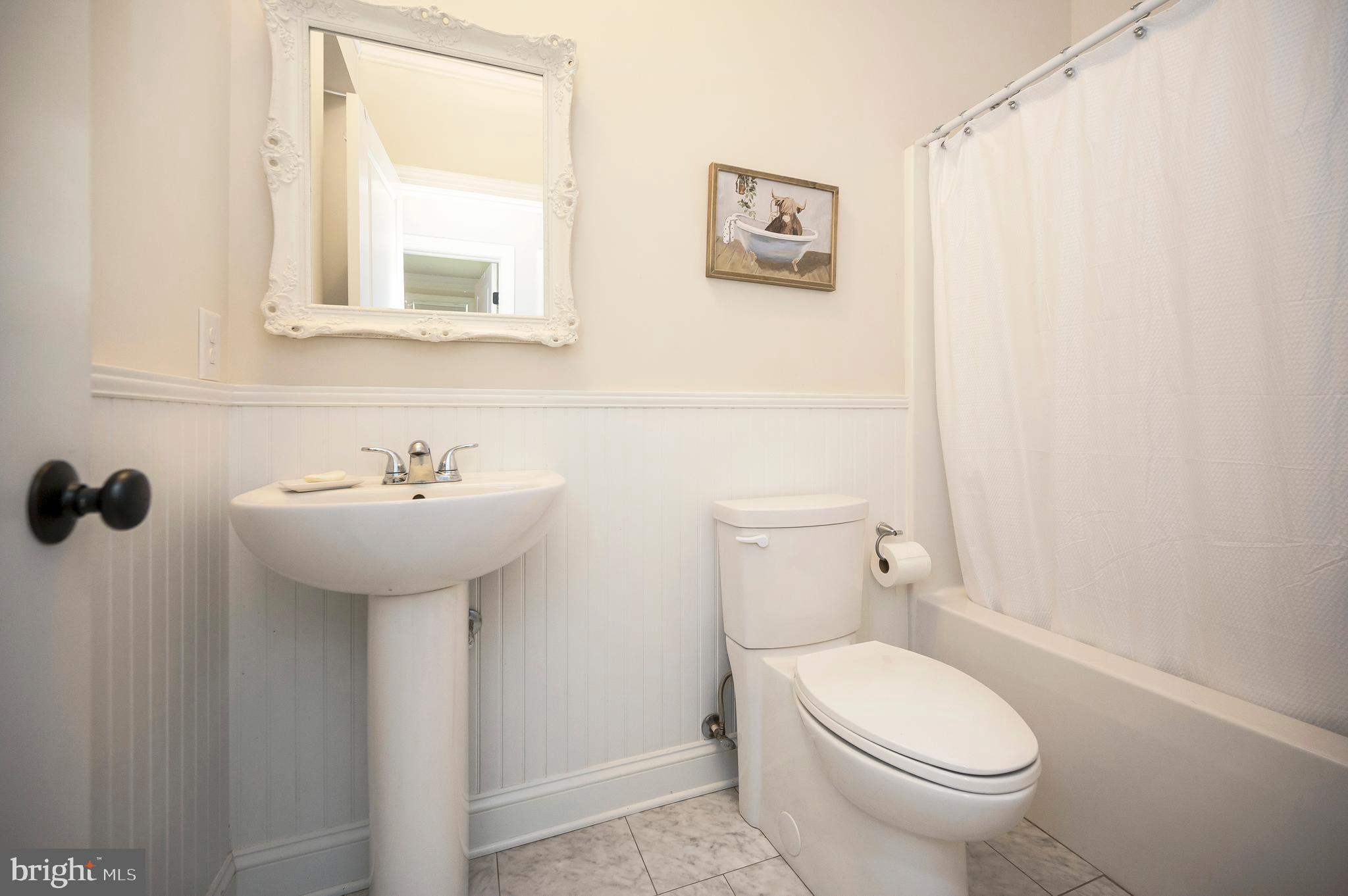29288 Old Rhoadesville, VA 22542 - Photo 28 of 63 a bathroom with a sink mirror and toilet