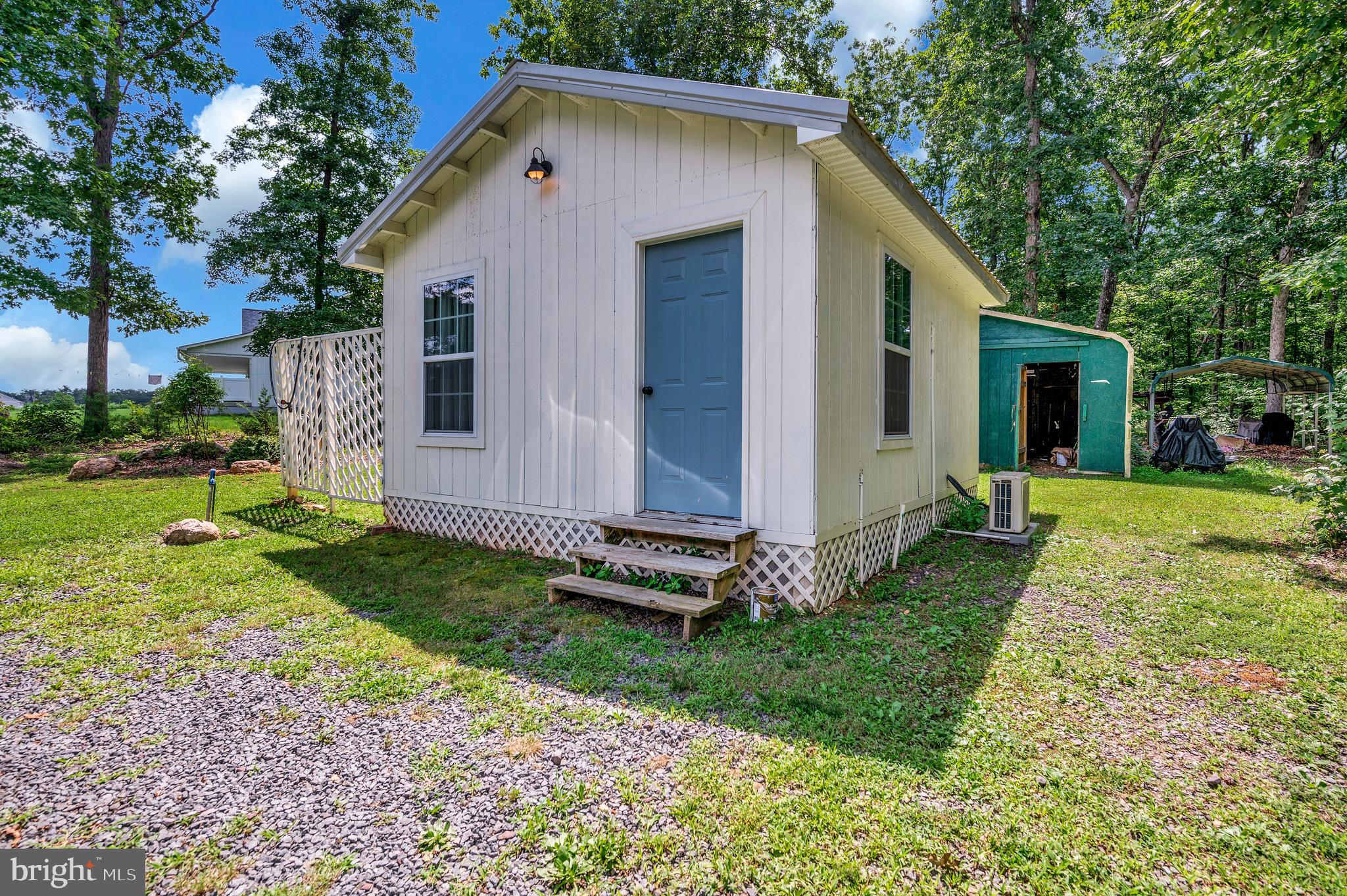29288 Old Rhoadesville, VA 22542 - Photo 29 of 63 a view of a house with backyard and trees