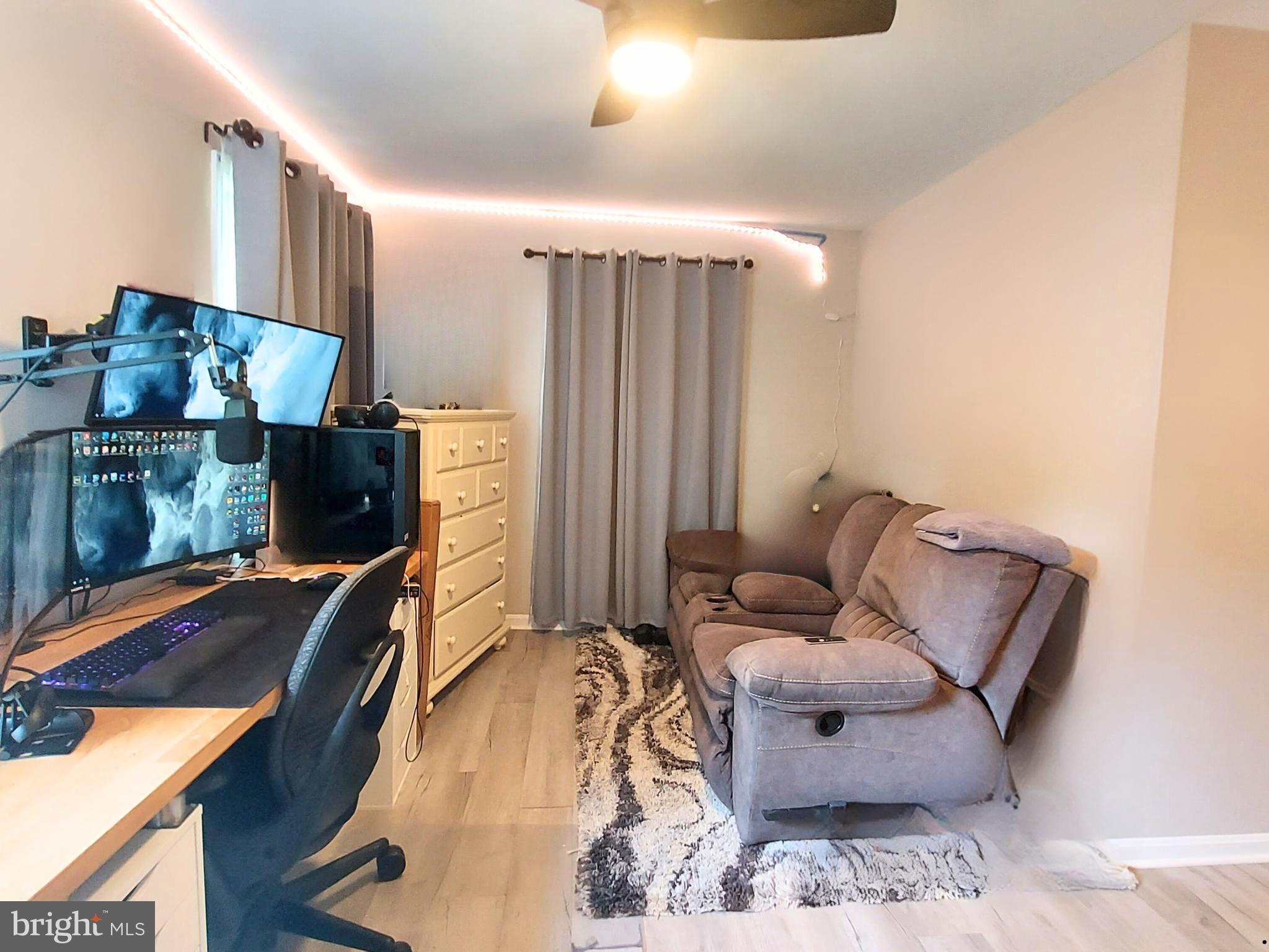 29288 Old Rhoadesville, VA 22542 - Photo 37 of 63 a living room with furniture and a flat screen tv