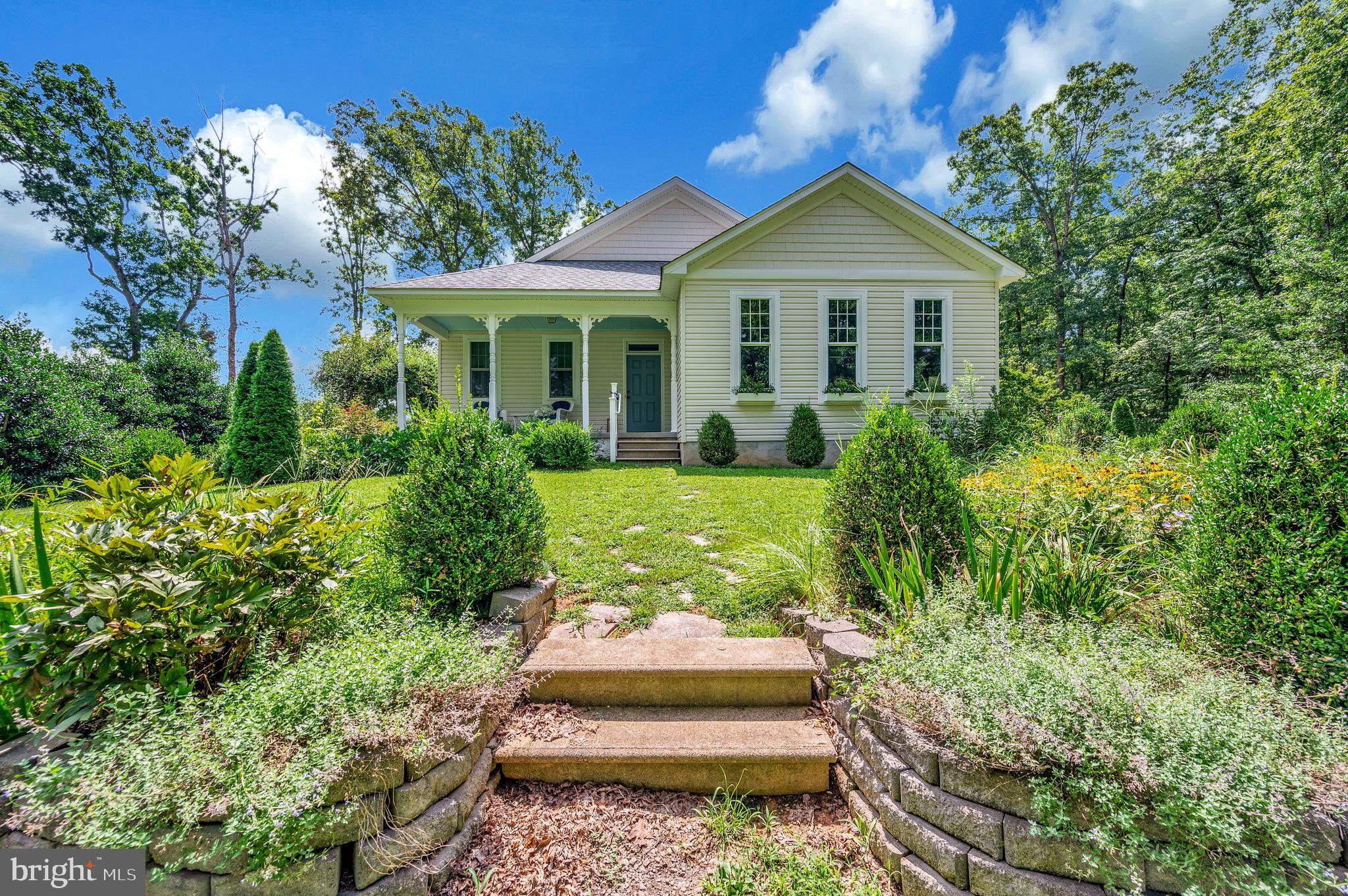 29288 Old Rhoadesville, VA 22542 - Photo 39 of 63 a front view of a house with a yard