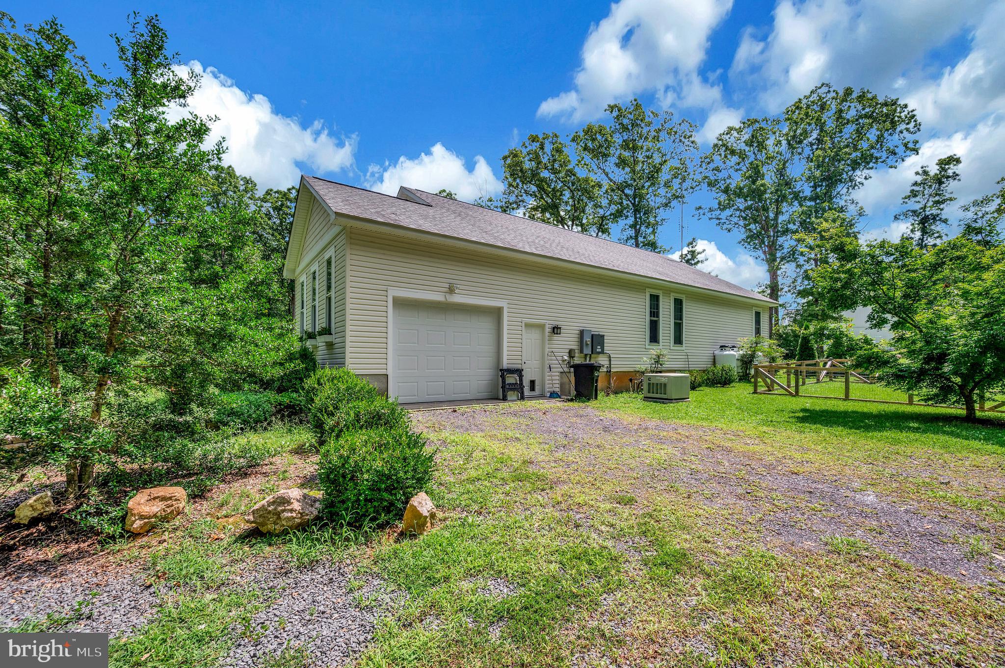 29288 Old Rhoadesville, VA 22542 - Photo 40 of 63 a view of a house with backyard and garden