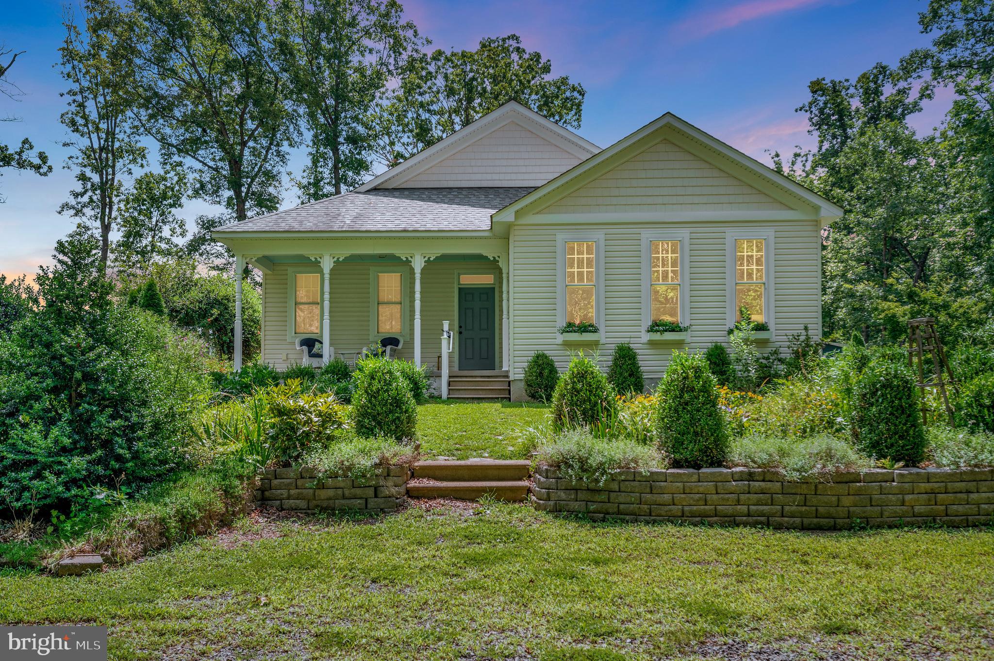 29288 Old Rhoadesville, VA 22542 - Photo 41 of 63 a front view of a house with a yard