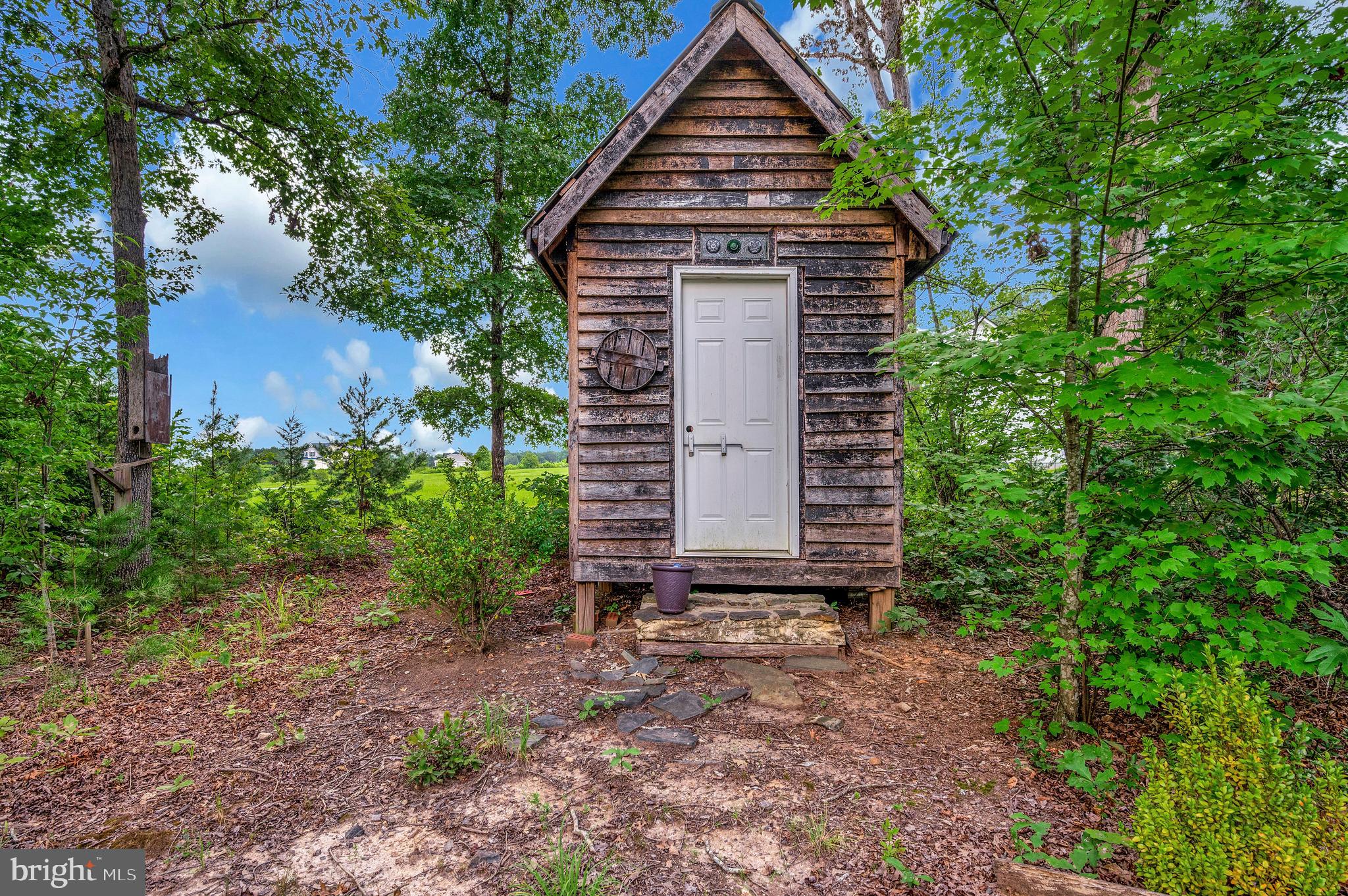 29288 Old Rhoadesville, VA 22542 - Photo 42 of 63 a pathway of a house with potted plants