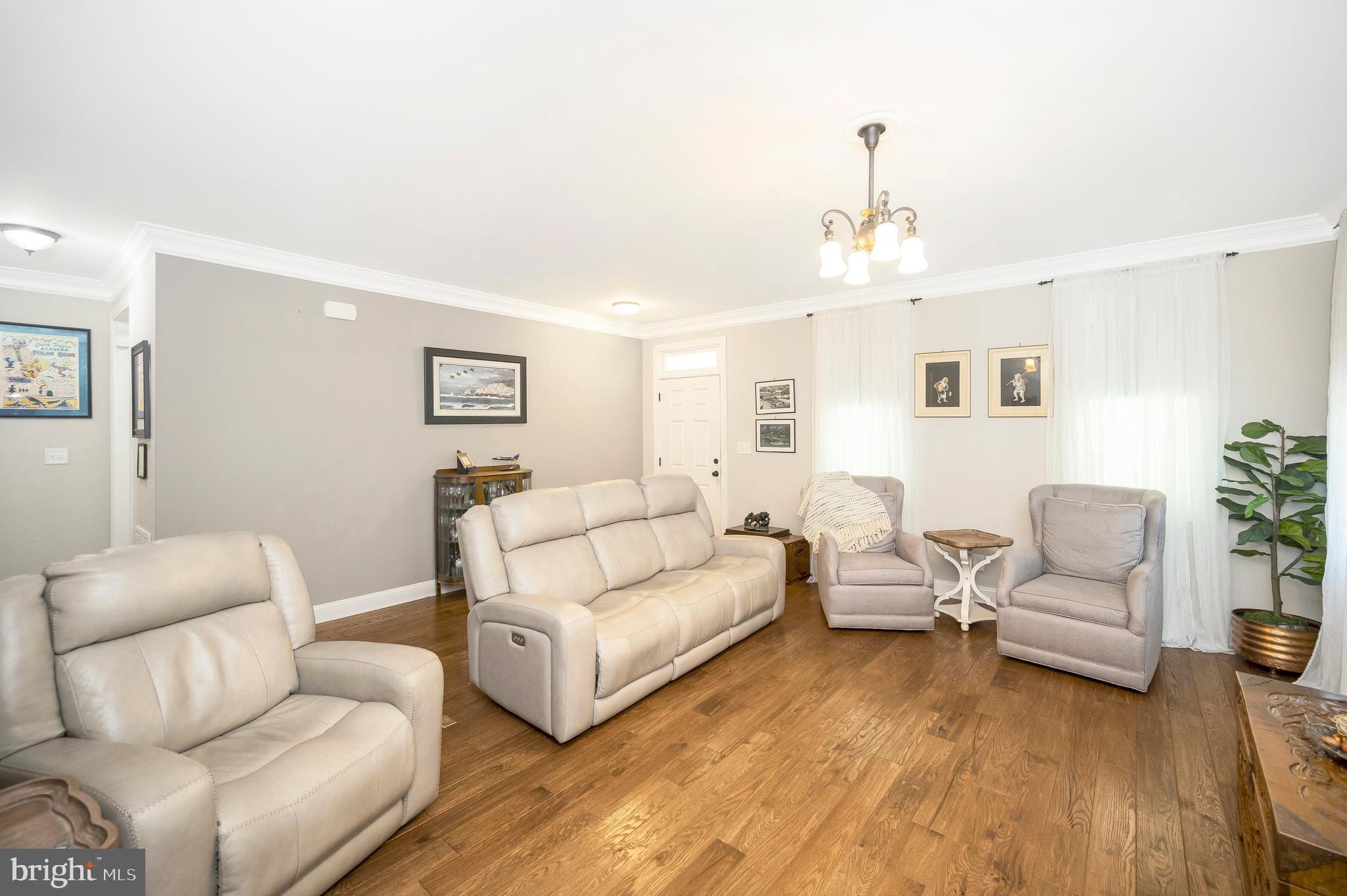 29288 Old Rhoadesville, VA 22542 - Photo 5 of 63 a living room with furniture and a chandelier