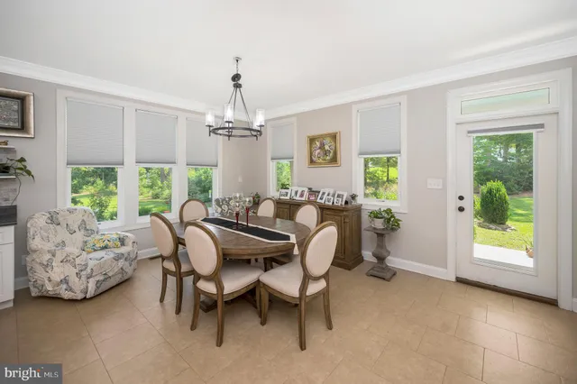a kitchen with stainless steel appliances a stove a refrigerator and a refrigerator