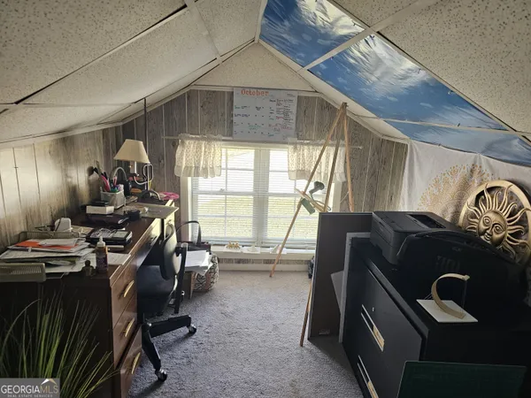 a bed room with two bed and a couch