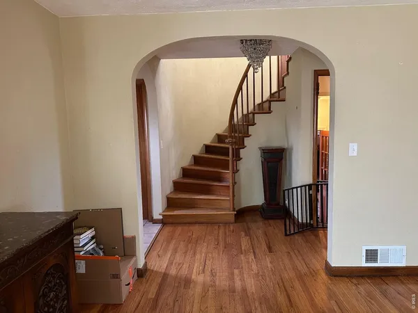 a view of entryway with wooden floor