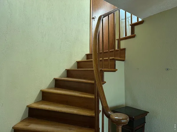 a kitchen with a sink stove and microwave