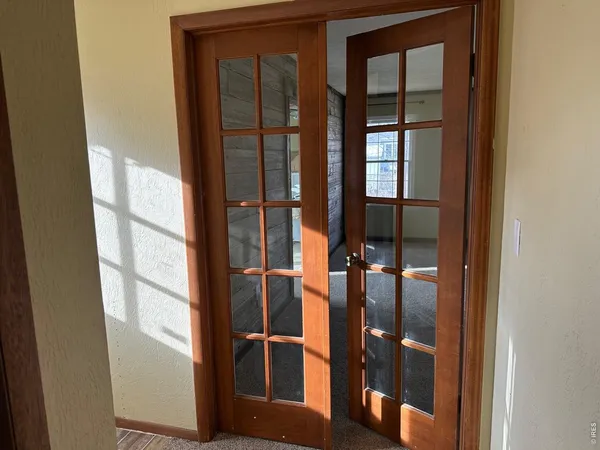 a view of staircase with mirror