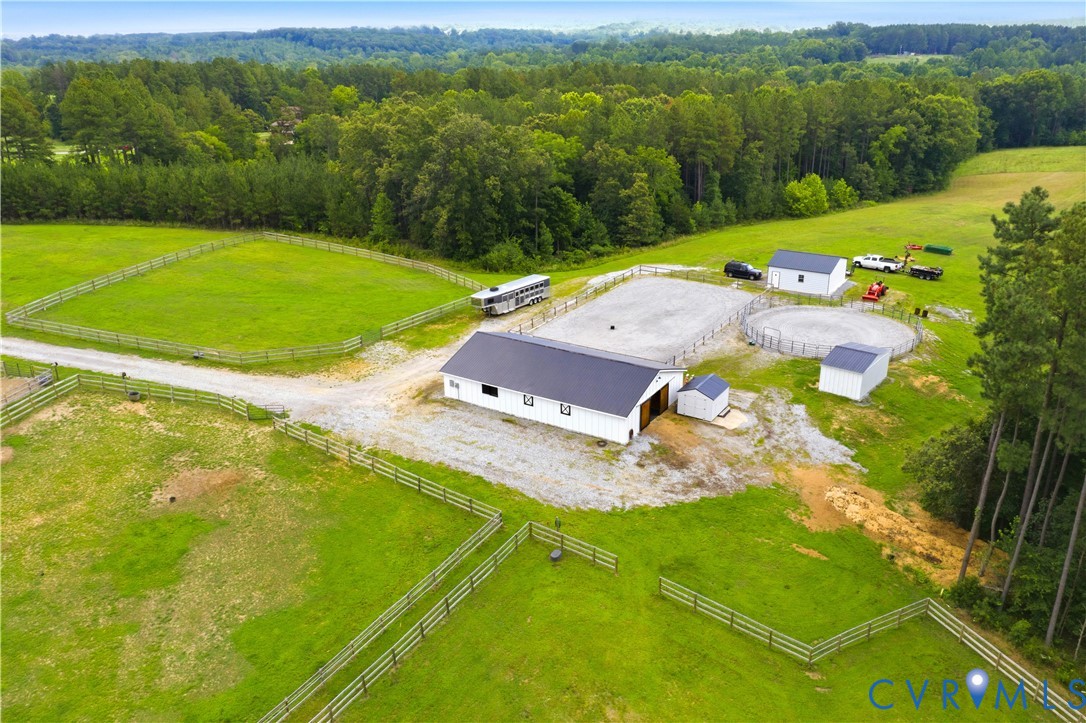 25181 West Soap Stone Road Jetersville, VA 23083 - Photo 51 of 54 Expansive property featuring a white barn with a d