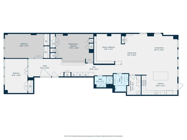 a view of a dining room and livingroom with furniture wooden floor a rug and a chandelier