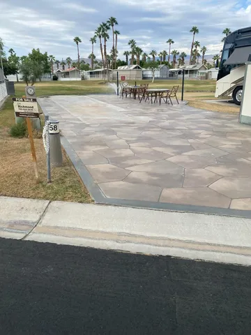 a view of a swimming pool with an outdoor space