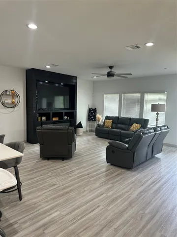 a kitchen with a refrigerator stove and sink