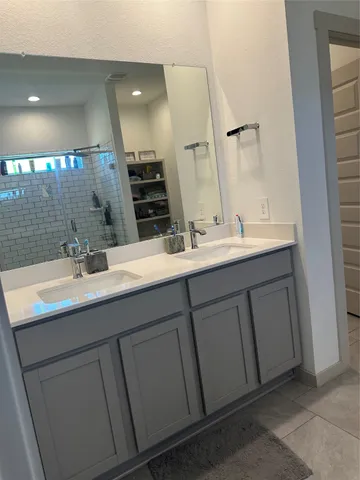 a view of a hallway view with wooden floor and staircase