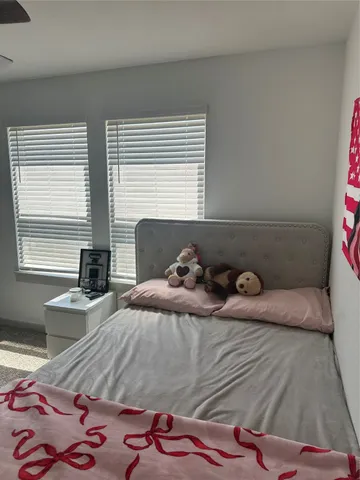 a kitchen with a sink a stove and a microwave