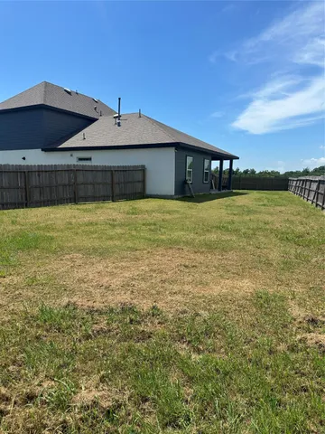 a front view of house with yard