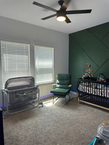 a wooden bench sitting in front of a door