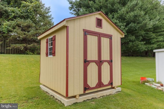 a view of a backyard with a garden