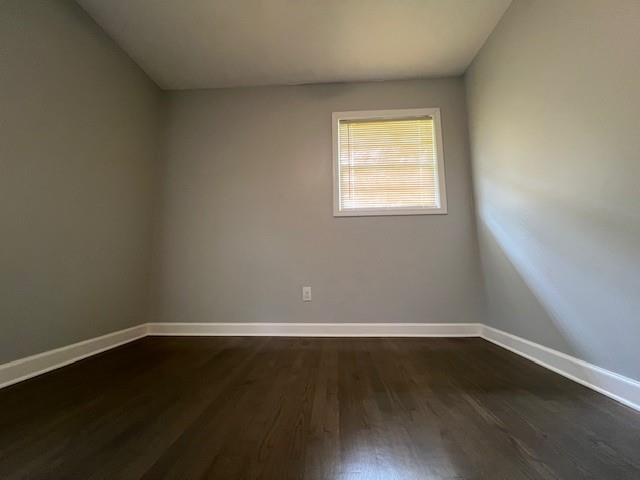6935 Fielder Road Rex, GA 30273 - Photo 18 of 22 a view of a small space with wooden floor and a window