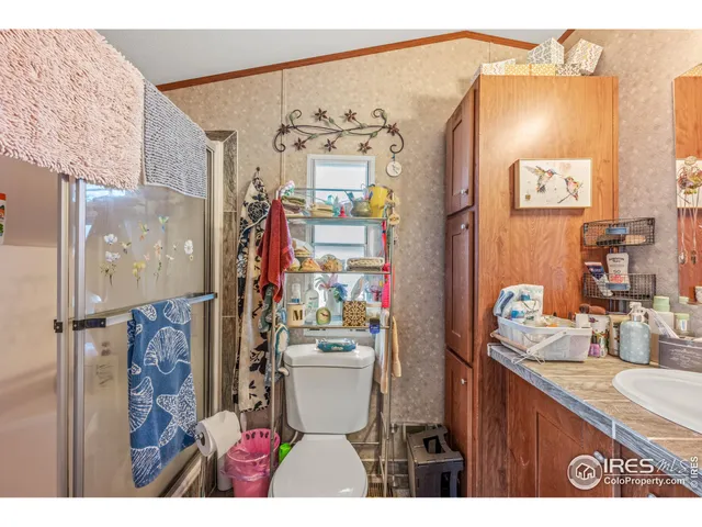 a view of living room with furniture and fan