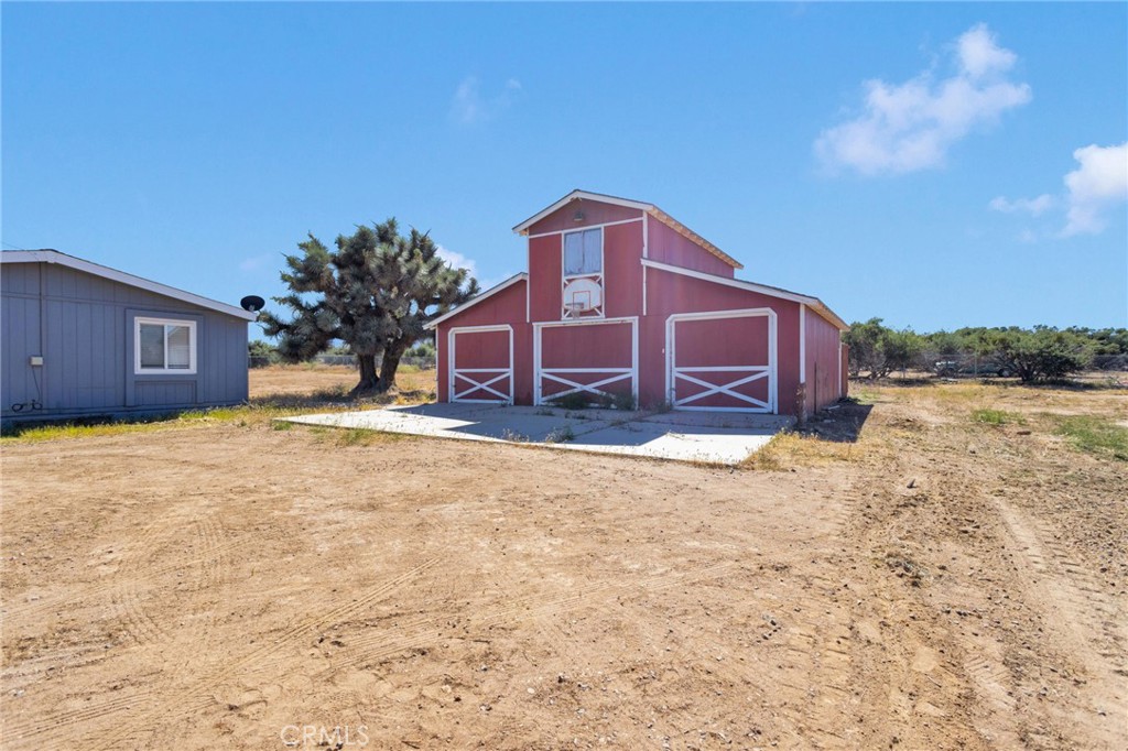 8074 Mira Mar Road Phelan, CA 92371 - Photo 34 of 49 a house view with a outdoor space