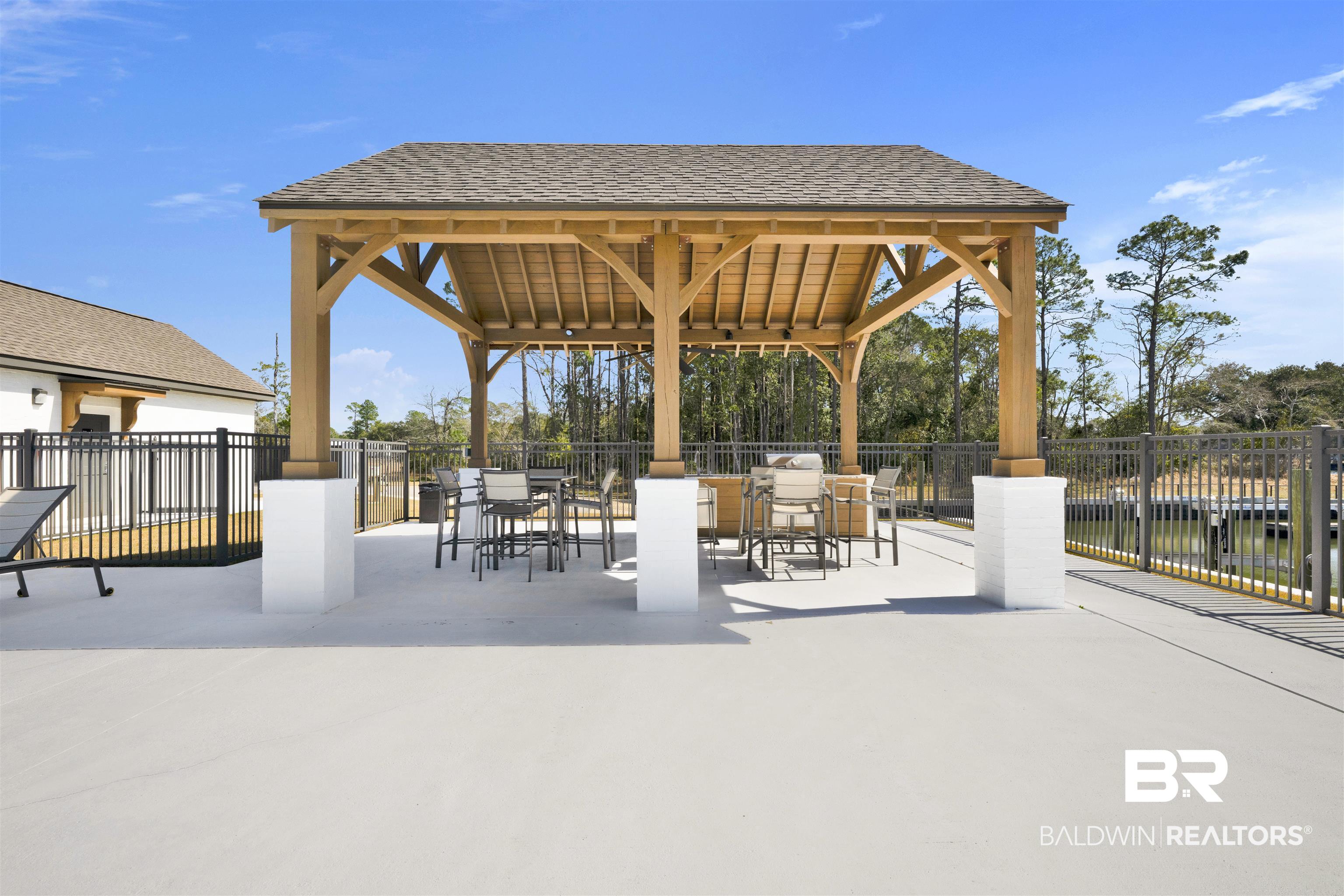 861 Inlet Circle Gulf Shores, AL 36542 - Photo 42 of 54 Surrounding community featuring a patio area and outdoor dining space