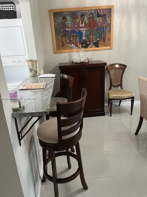 6100 Northwest 44th Street, Unit 405 Lauderhill, FL 33319 - Photo 20 of 46 a living room with furniture and a potted plant